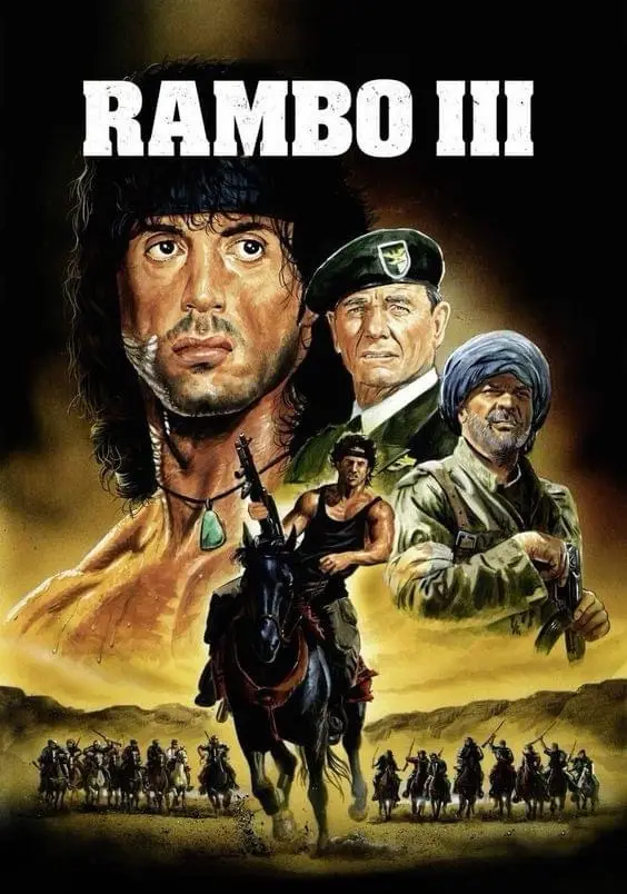 The movie poster for 'Rambo III' features a large portrait of Sylvester Stallone as John Rambo with a bandana and necklace…