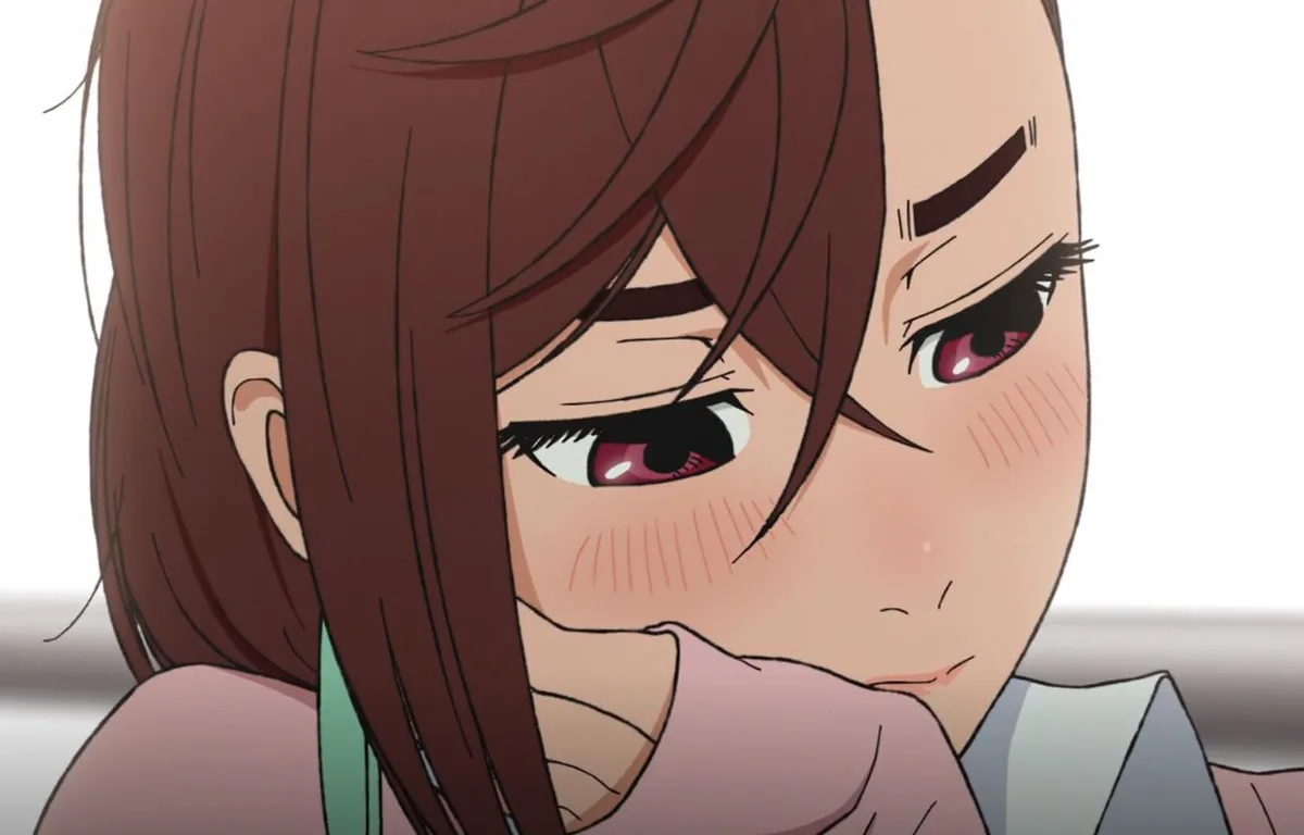 a close-up anime girl with brown hair and red eyes looks down with a pouty, teary expression, her cheeks flushed and a…