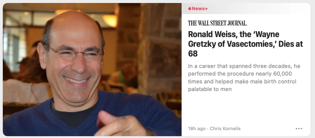 A smiling bald man in glasses and a blue sweater is shown next to a news article from The Wall Street Journal about Ronald…