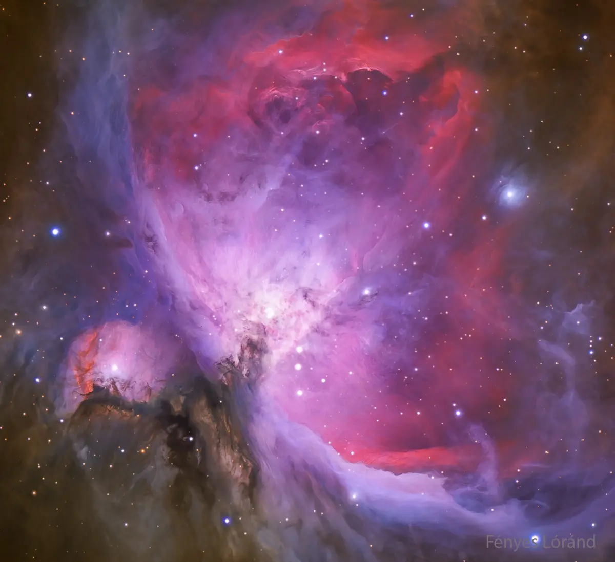 A vibrant cosmic nebula image, featuring swirling clouds of red, purple, and blue gas with numerous bright stars scattered…