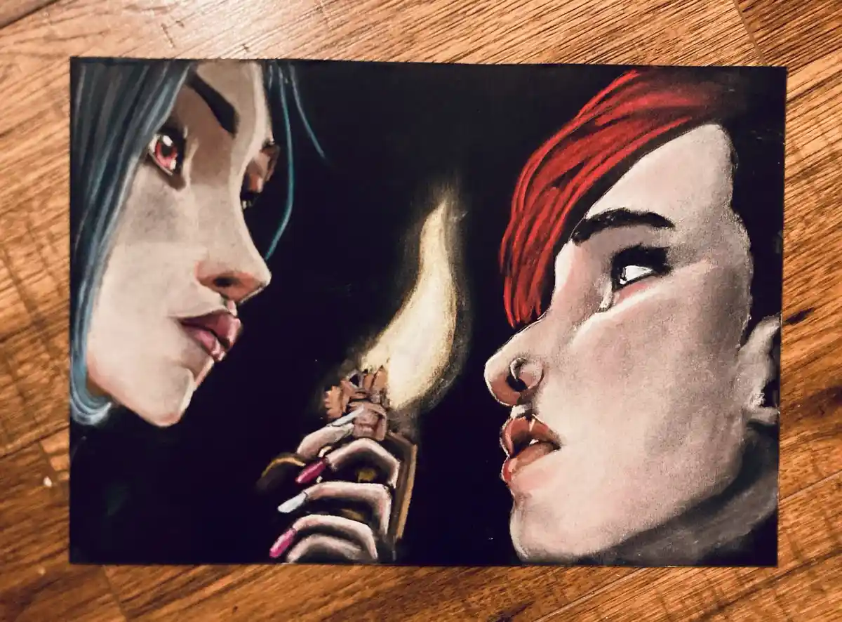 A hand-drawn artwork depicts two anime-style characters facing each other in profile. The character on the left has blue…
