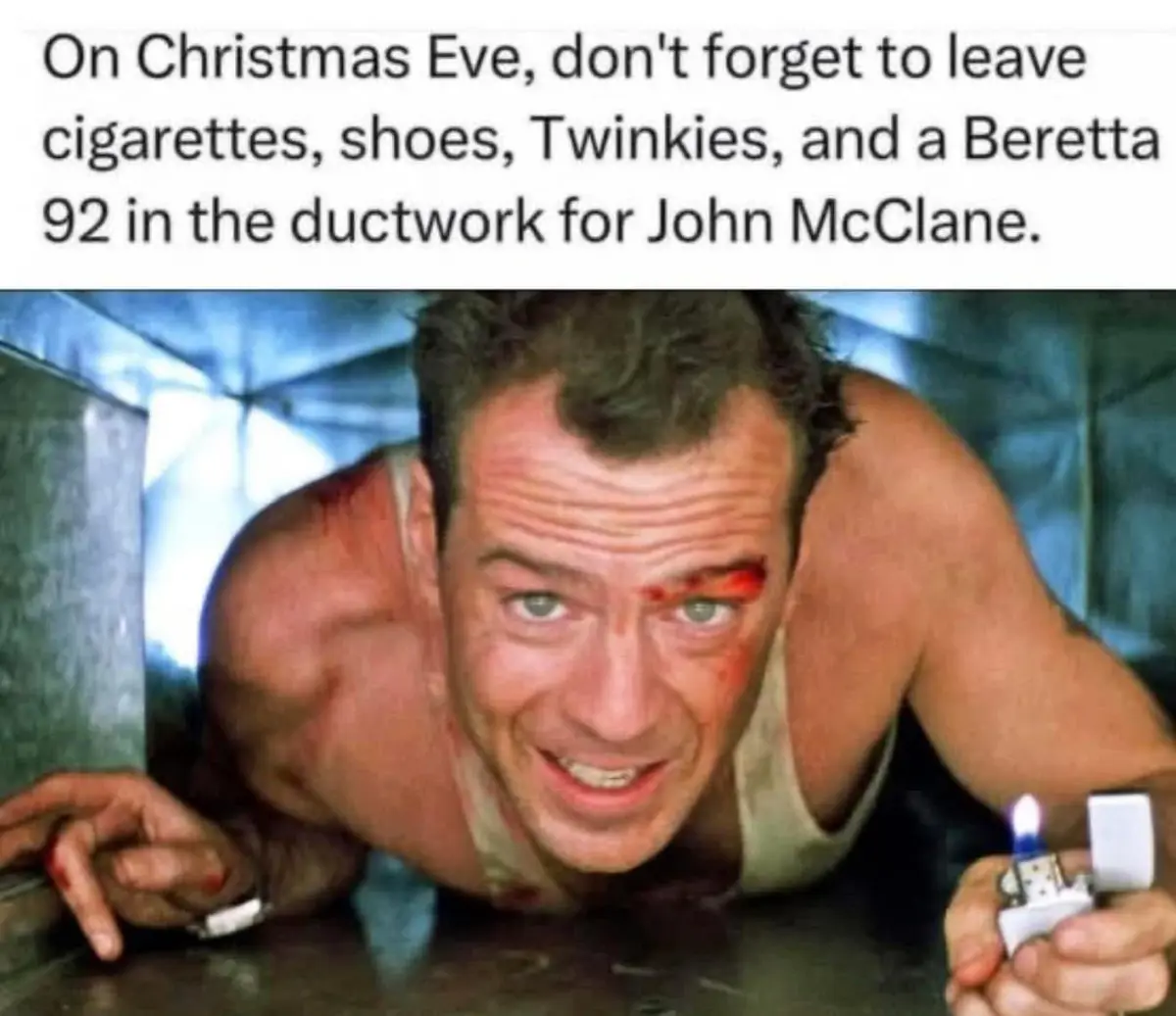 A shirtless, bloodied man with a bruised eye and a grin peers out from inside a metal duct while holding a lit lighter. The…