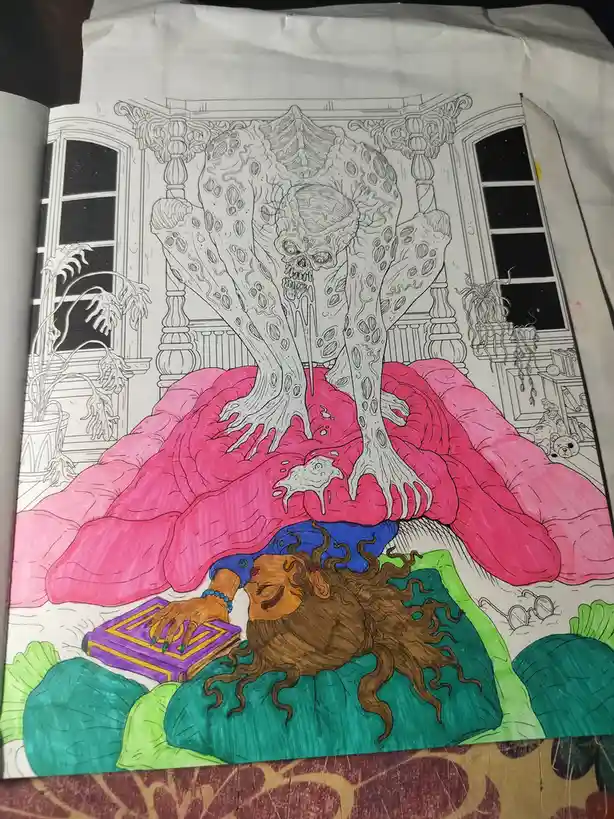 A coloring book page depicts a person sleeping peacefully in bed with a pink blanket, while a large, grotesque, skeletal…
