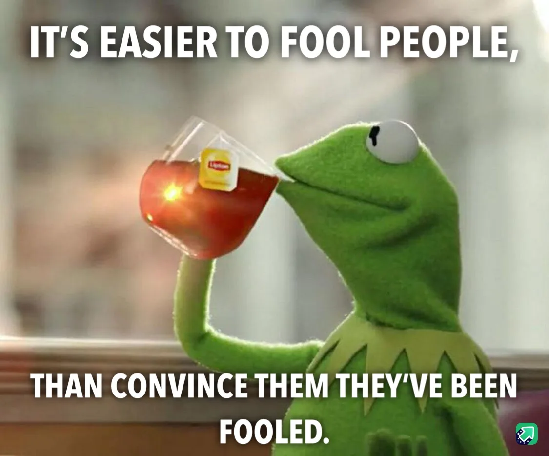 A green frog puppet, Kermit the Frog, is shown drinking from a glass of tea with a Lipton tea bag tag visible. The image has…