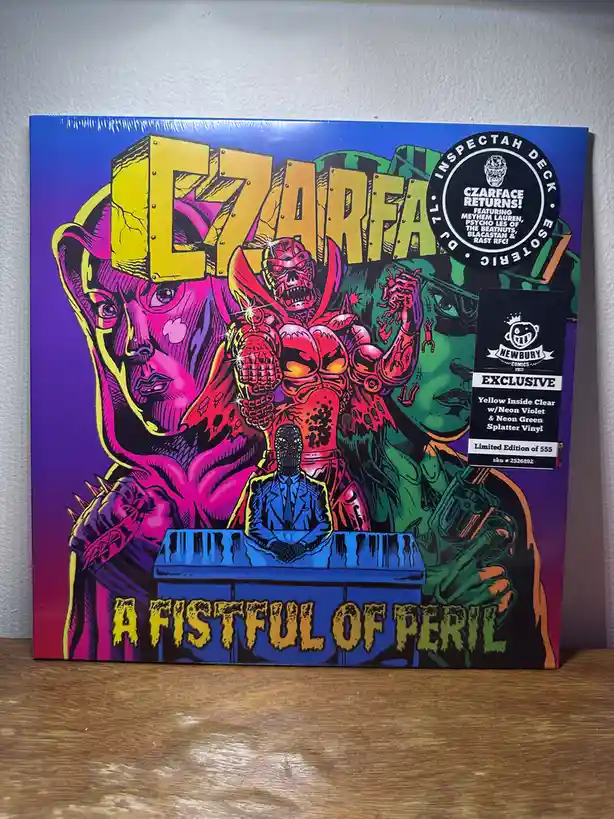 A vibrant, comic-book style album cover for 'Czarface - A Fistful of Peril' featuring a central demonic figure holding a…