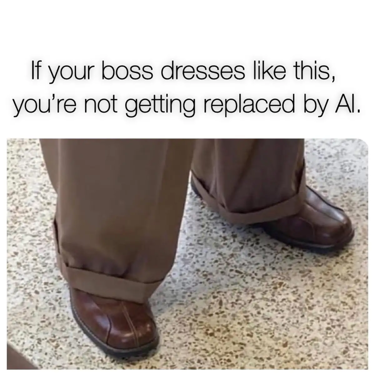 The image shows a close-up of a person's lower legs and feet wearing brown trousers with cuffs rolled down over brown dress…