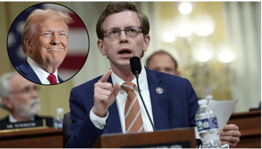 A man in a suit and glasses speaks at a podium, pointing forward, with a circular inset image of Donald Trump smiling beside…