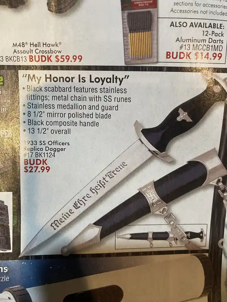A product catalog page shows a replica dagger labeled '1933 SS Officers Replica Dagger' with a price of $27.99. The dagger…
