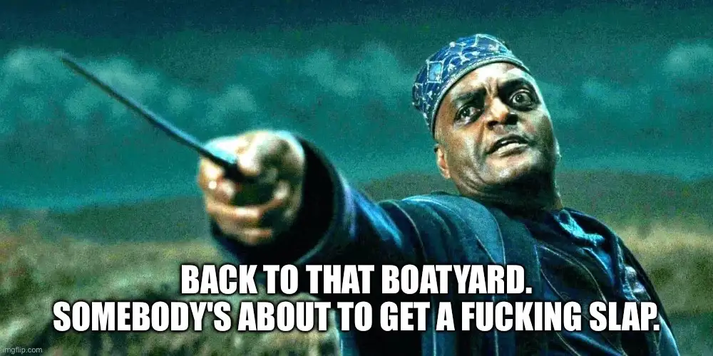 A man in a blue robe and patterned headwrap points a wand forward with an intense, angry expression. The overlaid text reads…