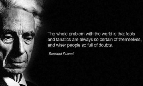 A black-and-white portrait of Bertrand Russell, looking somber and thoughtful, with a quote attributed to him overlaid on…