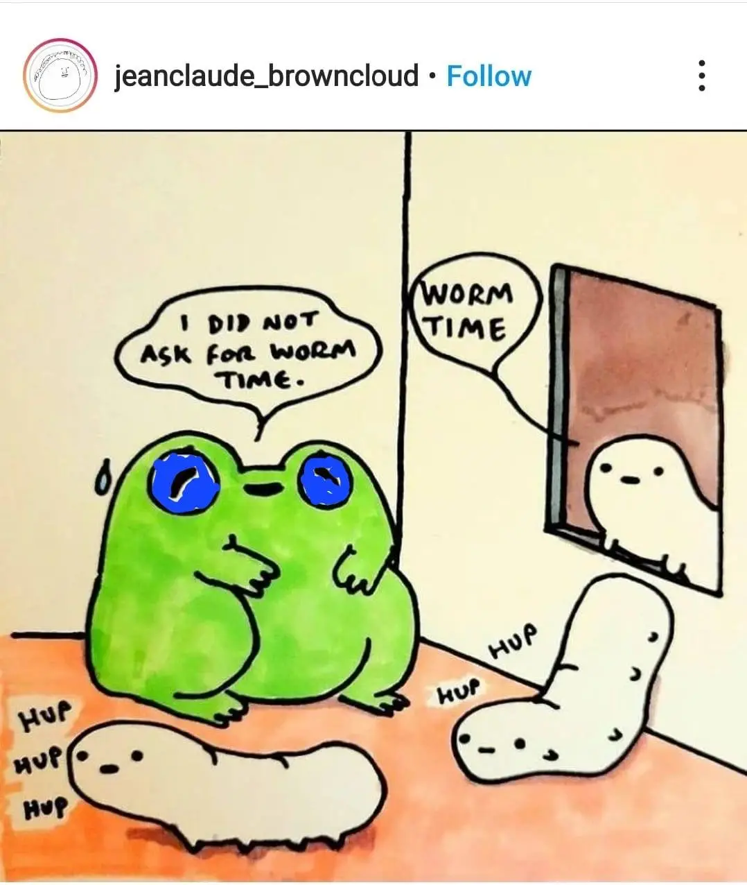 A green cartoon frog with blue eyes and a sweat drop looks distressed as two white worm-like creatures crawl on the floor…