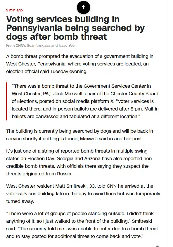 A screenshot of a CNN news article about a bomb threat at a Pennsylvania voting services building, which prompted a dog…