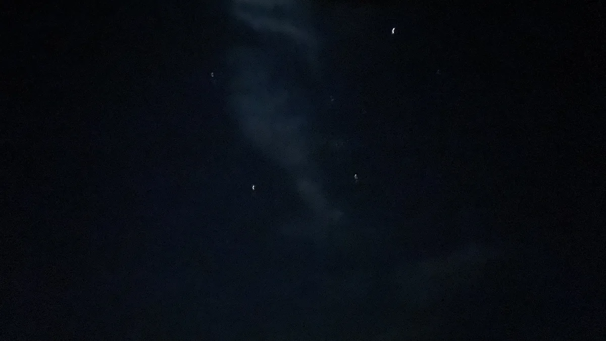 A dark night sky with faint clouds and a few visible stars, overlaid with the text 'i'm not crying, you're crying'. The…