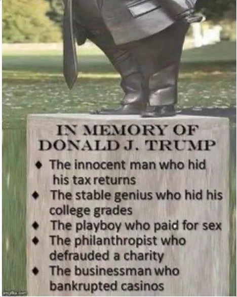 A bronze statue of Donald J. Trump is shown from the waist down, standing on a stone plaque that reads 'IN MEMORY OF DONALD…