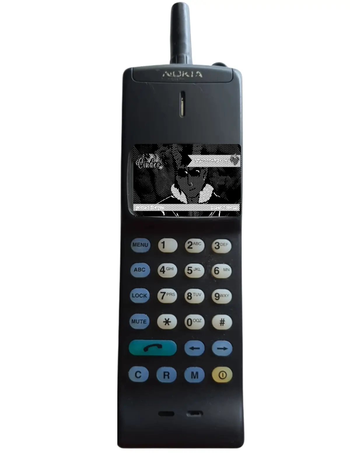 A black Nokia brick-style mobile phone with a physical keypad and antenna, displaying a halftone image of a man in a fedora…