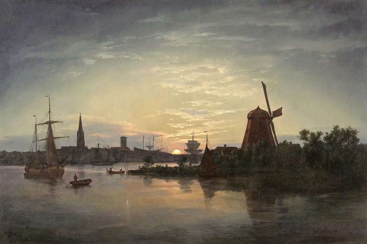 A serene 19th-century painting depicts a Dutch river scene at sunset with sailboats, a windmill, and a church spire…