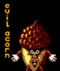 A pixelated, retro-style video game character resembling an acorn with a menacing face, wide eyes, and outstretched arms…