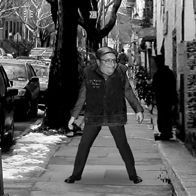 A black-and-white photo collage shows a man in a vest and glasses walking down a city sidewalk in six sequential frames…