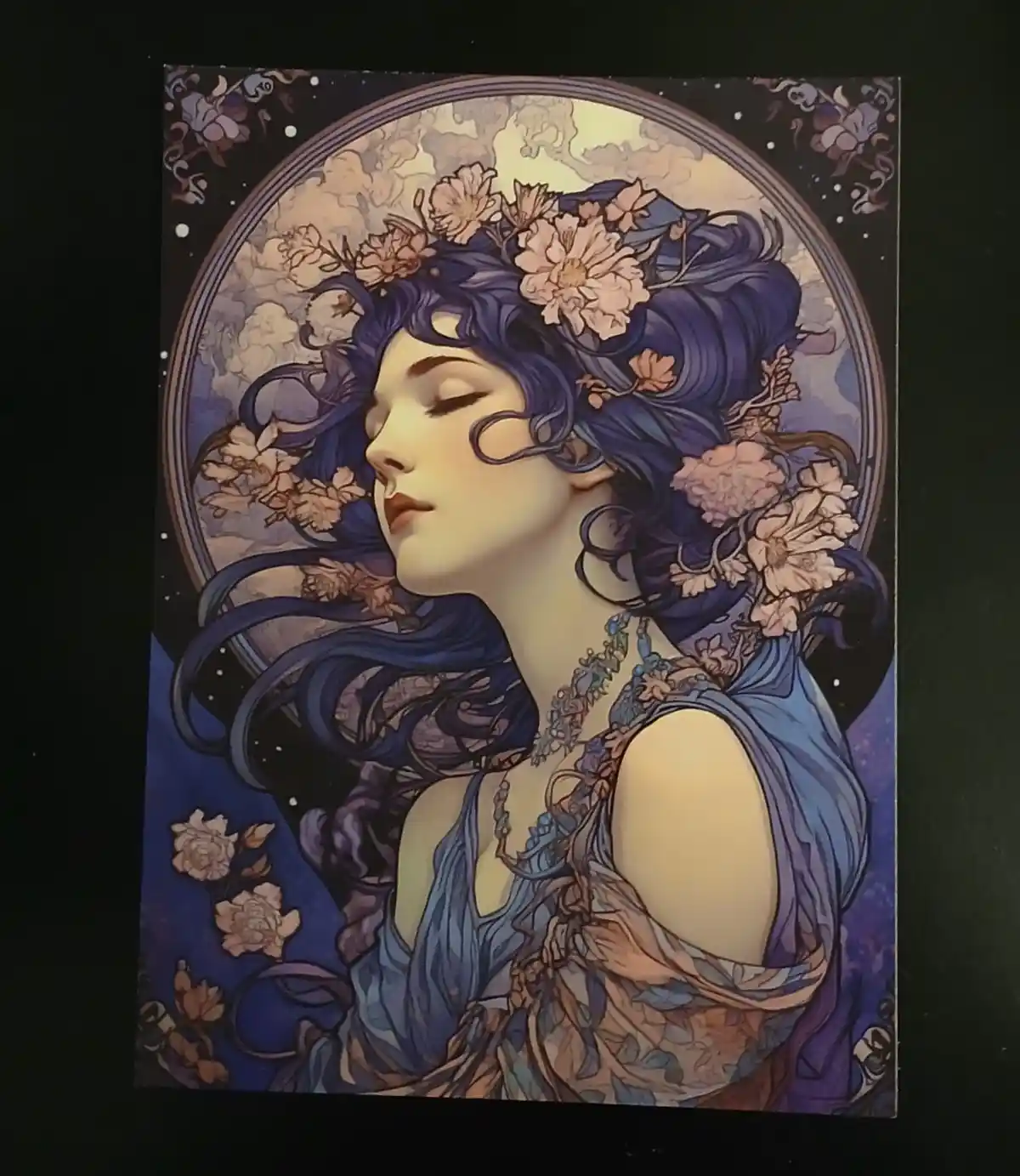 A stylized illustration of a woman with long, flowing blue hair adorned with pink flowers, shown in profile with her eyes…