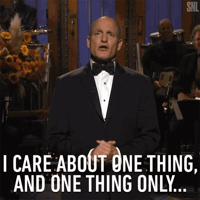 A six-panel meme featuring a bald man in a tuxedo on a stage with an orchestra behind him. In the first three panels, he…