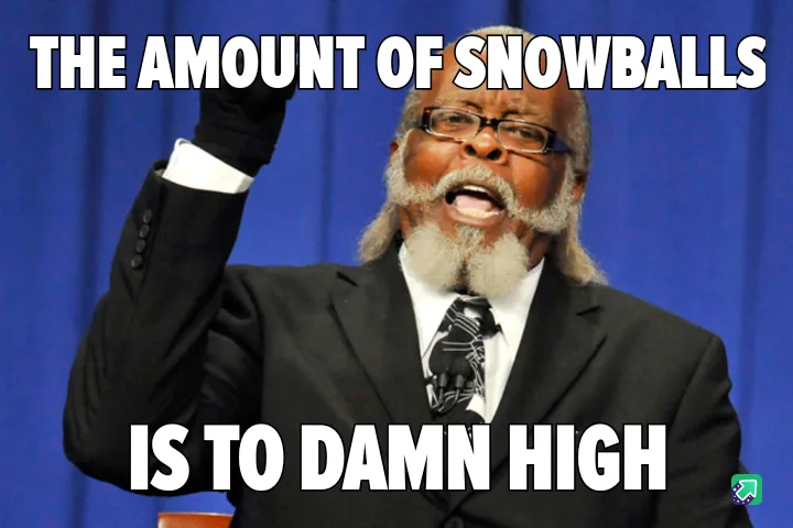 A man in a suit and glasses, raising his gloved hand, with bold white text overlaid that reads 'THE AMOUNT OF SNOWBALLS IS…