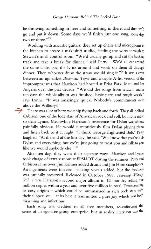A page from the book 'George Harrison: Behind The Locked Door' shows a paragraph about Harrison's admiration for Bob Dylan…