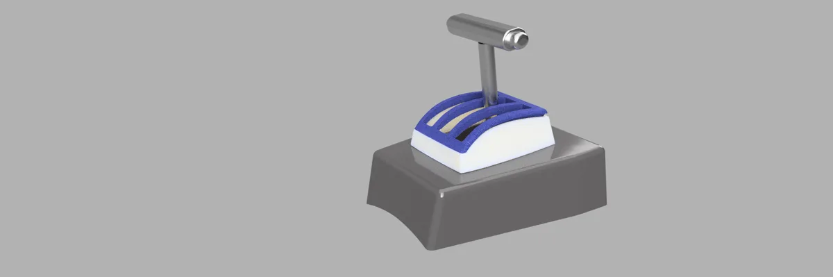A 3d rendered image shows a computer keyboard keycap with a blue sponge-like texture and a silver T-shaped handle protruding…