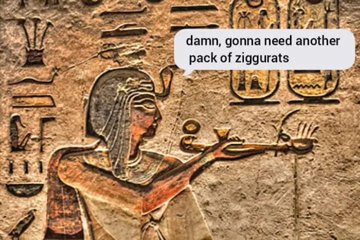 An ancient Egyptian relief carving of a figure in profile, holding a staff and an ankh, set against a background of…
