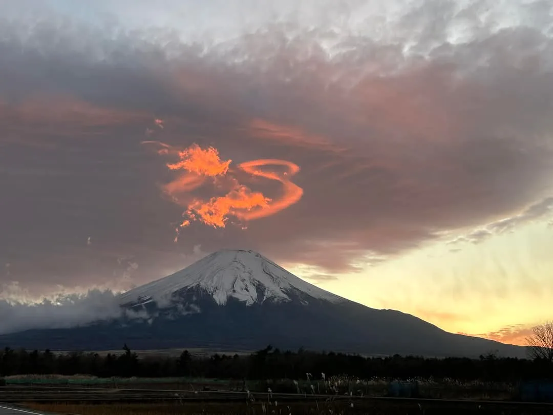 A Majestic Dragon Soars Above Mt. Fuji