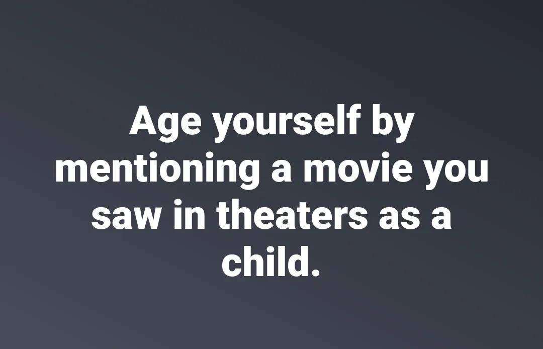 The image displays a solid dark gray background with centered white text that reads 'Age yourself by mentioning a movie you…