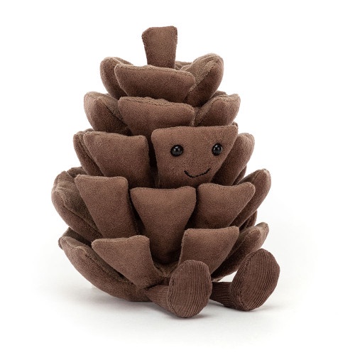 A brown, plush, stuffed pinecone toy with a smiling face, black button eyes, and small corduroy feet, sitting upright…