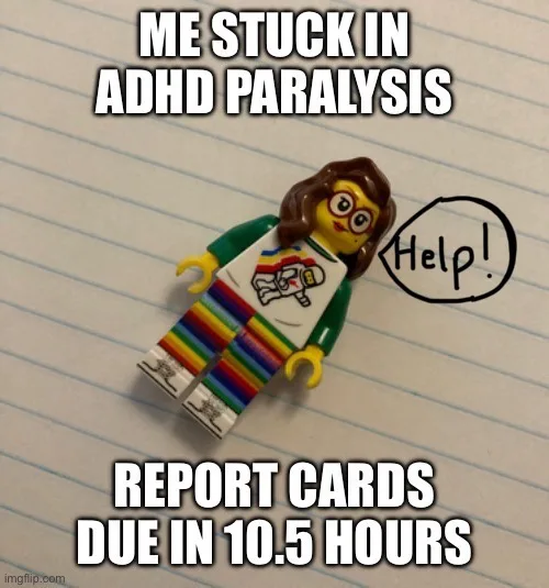 A Lego minifigure with brown hair and glasses lies motionless on lined notebook paper, with a hand-drawn speech bubble…