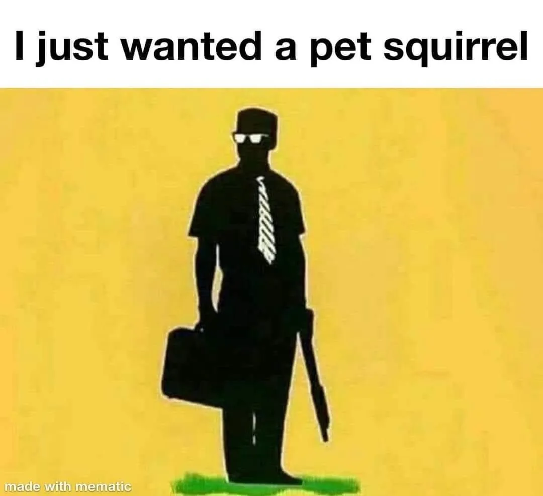 A black silhouette of a man wearing a top hat, sunglasses, and a striped tie, holding a briefcase and a rifle, stands on a…