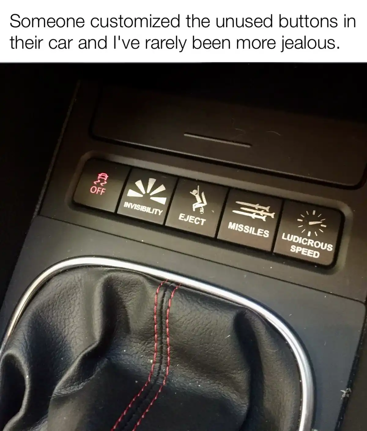 A close-up photo of a car's center console shows five custom-labeled buttons next to a gear shift. The buttons are labeled…