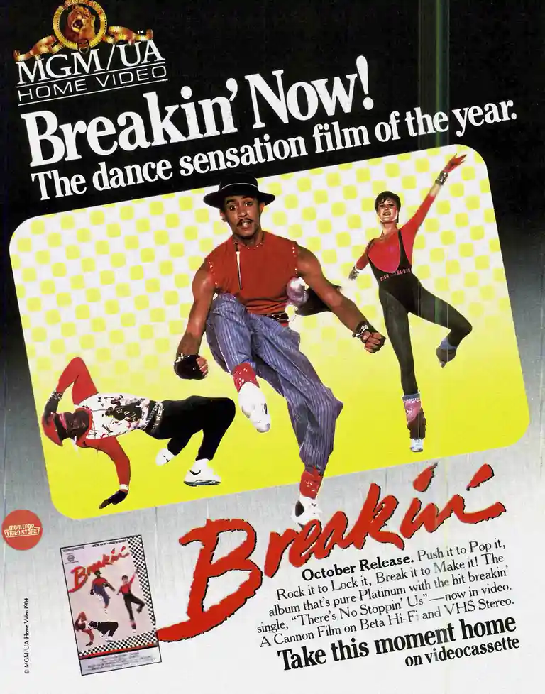 This is a vintage 1984 MGM/UA Home Video advertisement for the film 'Breakin''. It features three breakdancers in dynamic…