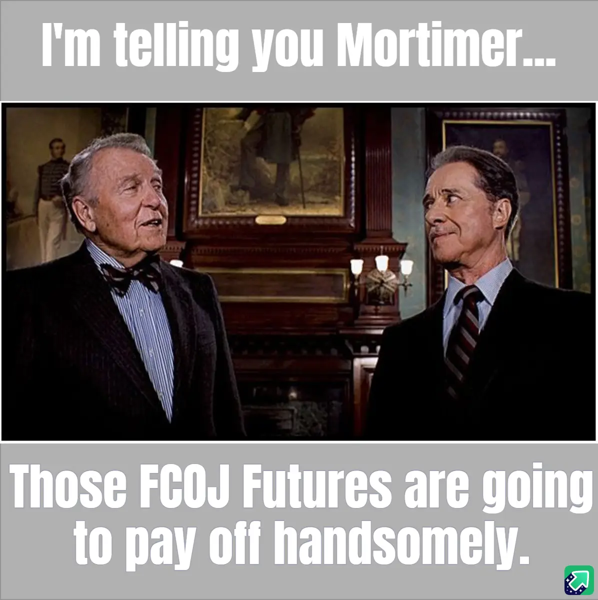 Two men in suits stand in an ornate room, one speaking earnestly to the other. The top text reads 'I'm telling you…