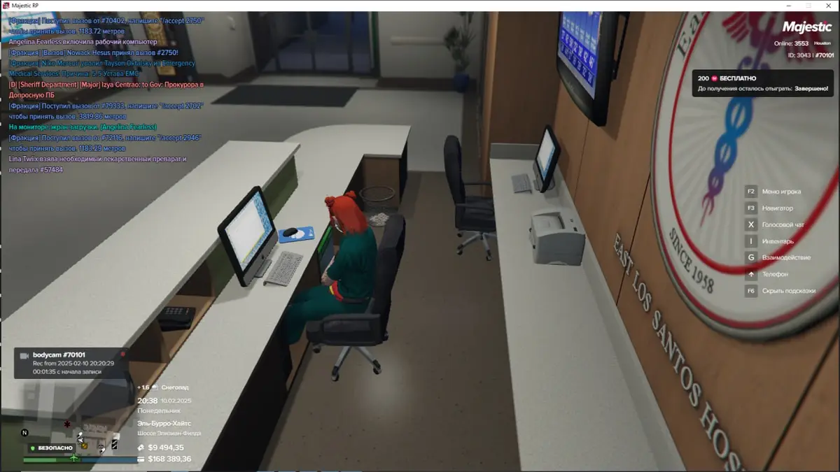 A screenshot from the video game GTA Online shows a female character with red hair sitting at a desk in the East Los Santos…