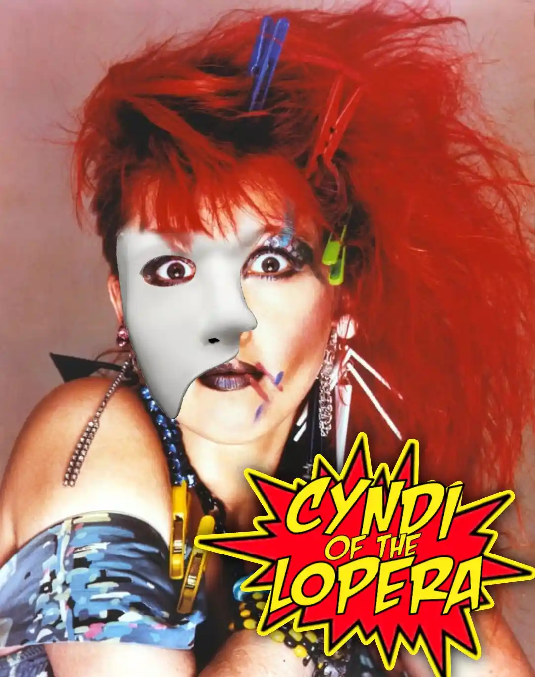 A person with bright red hair clipped up, wearing heavy makeup and a half-mask over their face, with a comic-style red and…