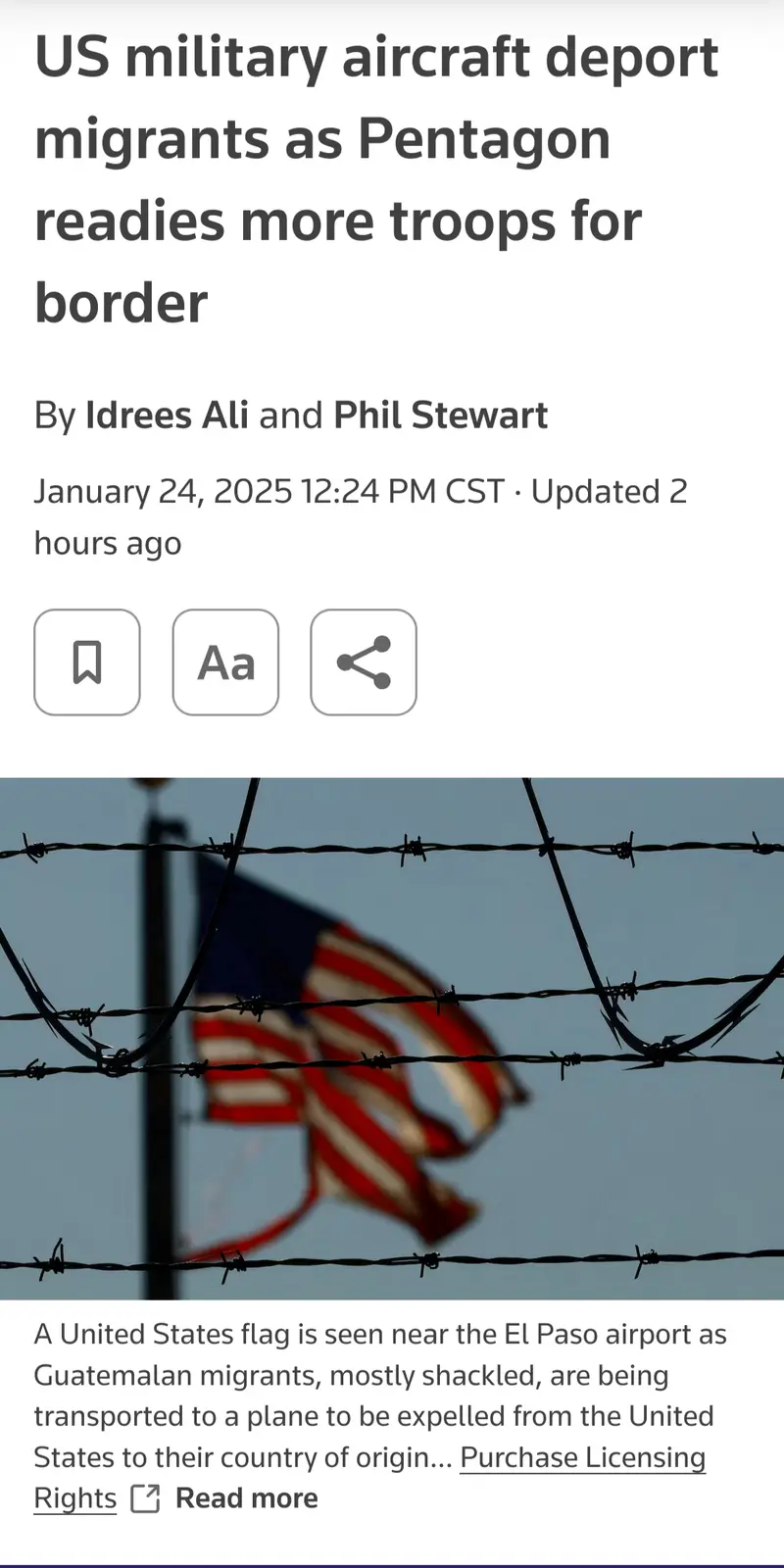 A screenshot of a news article header showing a blurred American flag behind barbed wire, with the headline 'US military…