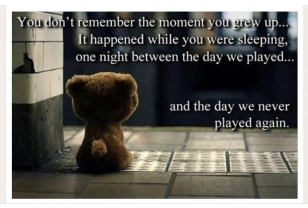 A brown teddy bear sits alone on a tiled floor, viewed from behind, looking toward a dimly lit doorway. Overlaid white text…