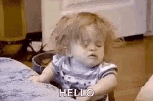 A six-panel GIF shows a sleepy toddler with curly hair in a striped shirt, initially sitting up and then progressively…