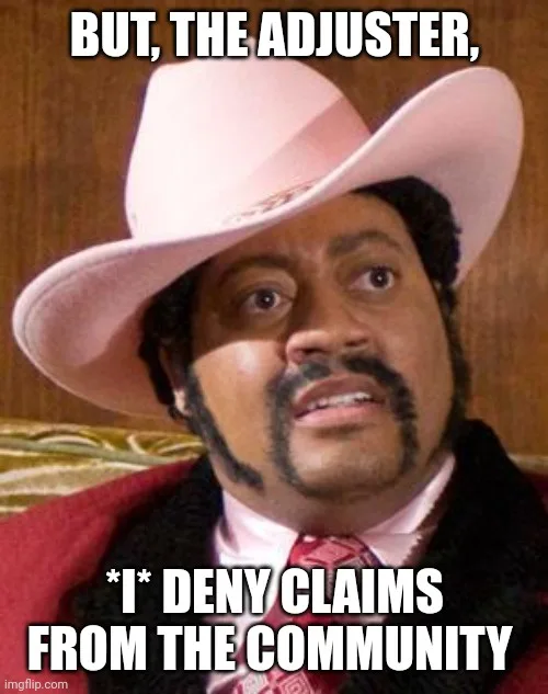 A man wearing a pink cowboy hat, red jacket, and patterned tie looks upward with a surprised or exasperated expression…