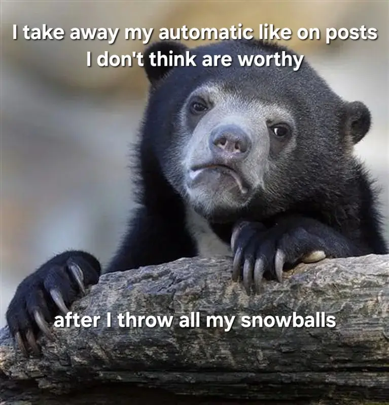A close-up photo of a black bear with a sad, disappointed facial expression, resting its paws on a log. White text is…