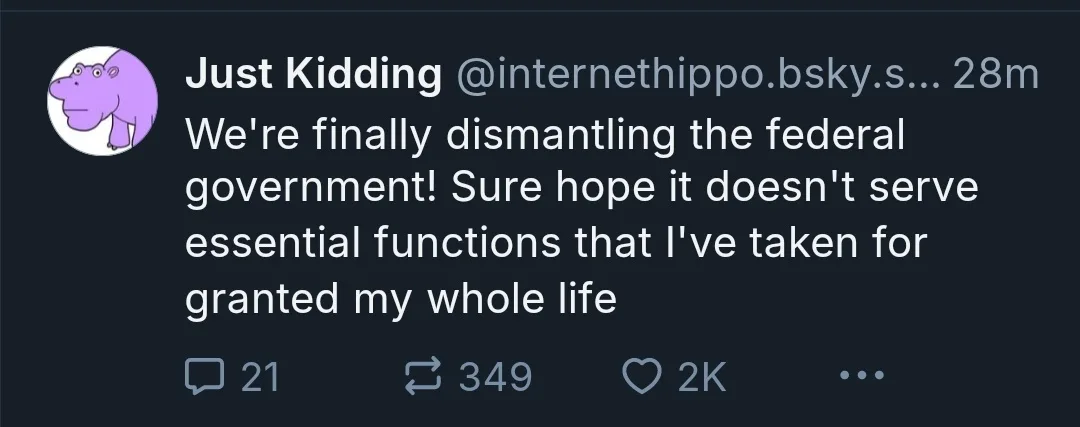 A screenshot of a social media post from a user named 'Just Kidding' with a purple hippo avatar. The post reads: 'We're…
