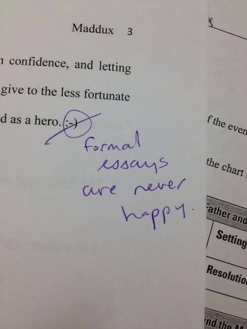 A close-up photo of a printed essay page with a handwritten note in purple ink that reads 'Formal essays are never happy.'…