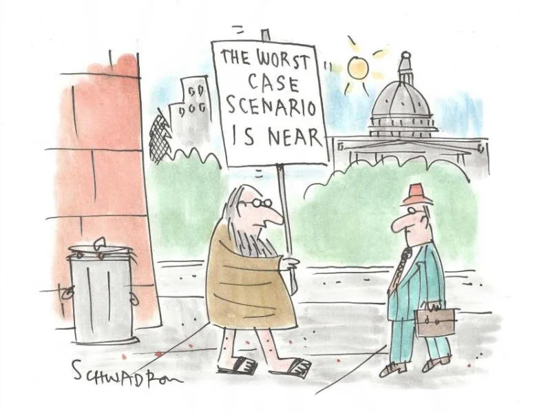 A cartoon depicts a man in a robe and sandals holding a sign that reads 'THE WORST CASE SCENARIO IS NEAR' while walking on a…