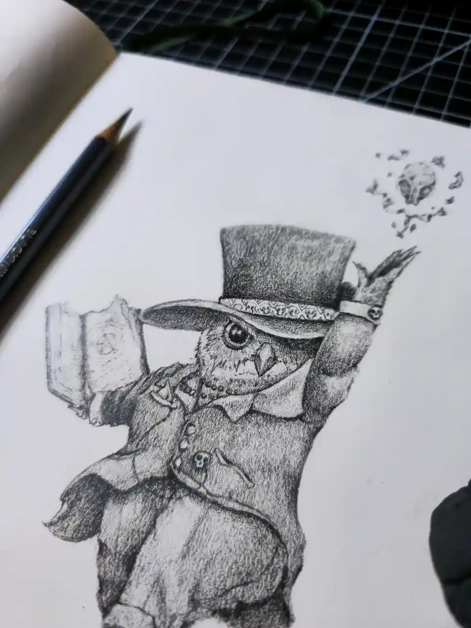 A detailed pencil sketch of an owl wearing a top hat with a skull-patterned band, a formal coat, and holding a book, with a…