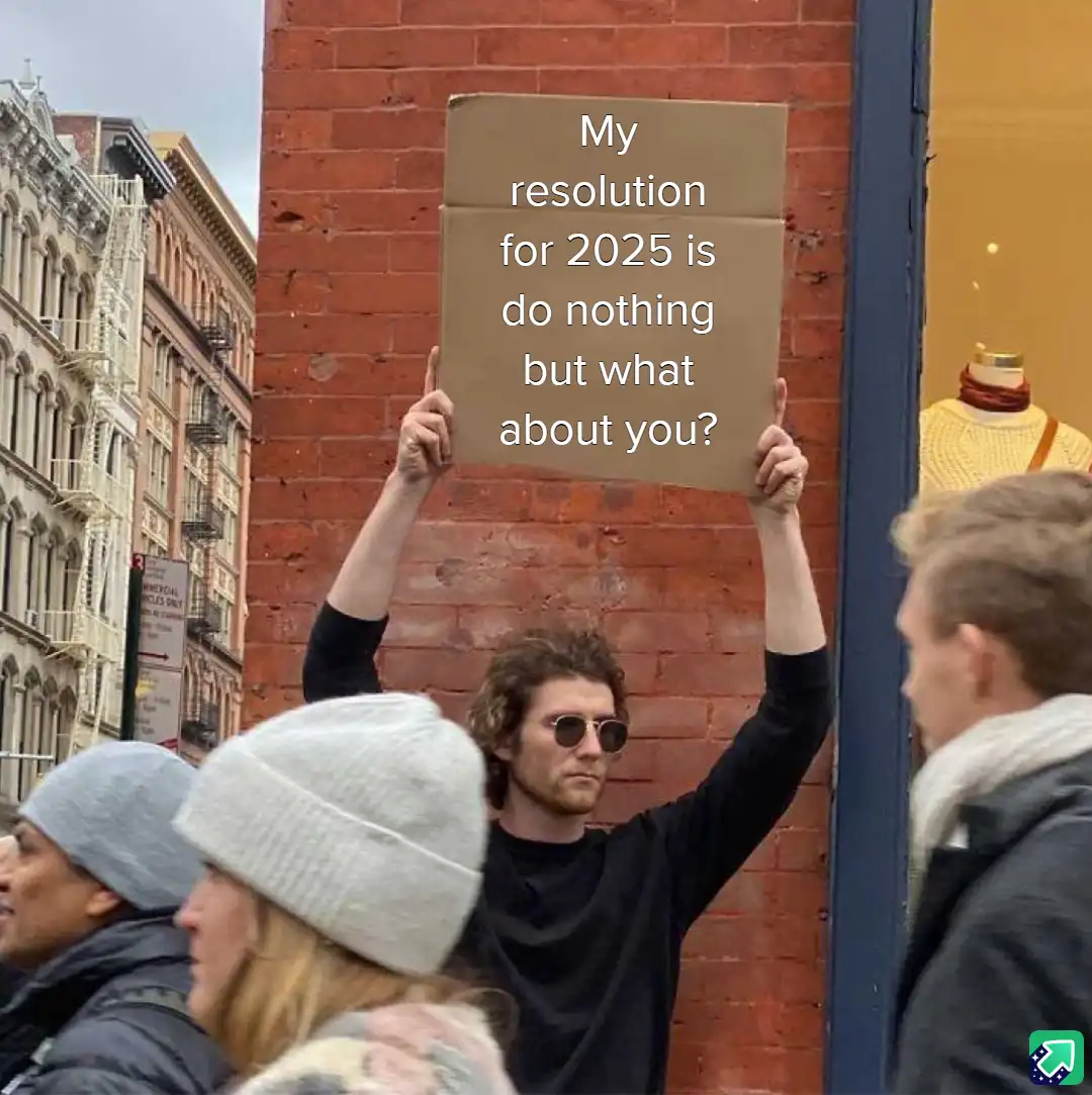 A man with curly hair and sunglasses holds up a cardboard sign with white text reading 'My resolution for 2025 is do nothing…