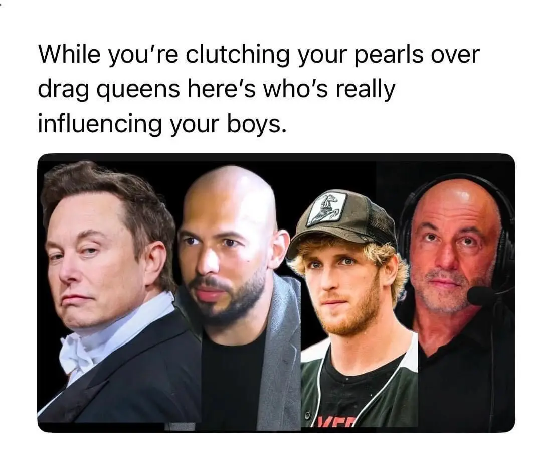 The image displays four men in a row: Elon Musk in a suit, a bald man with a beard, a young man in a baseball cap, and a…