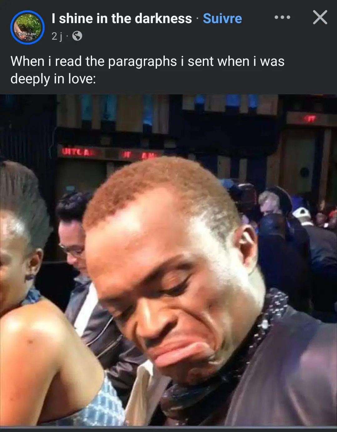 A screenshot of an Instagram post by 'I shine in the darkness' shows a man with a deeply embarrassed, cringing facial…